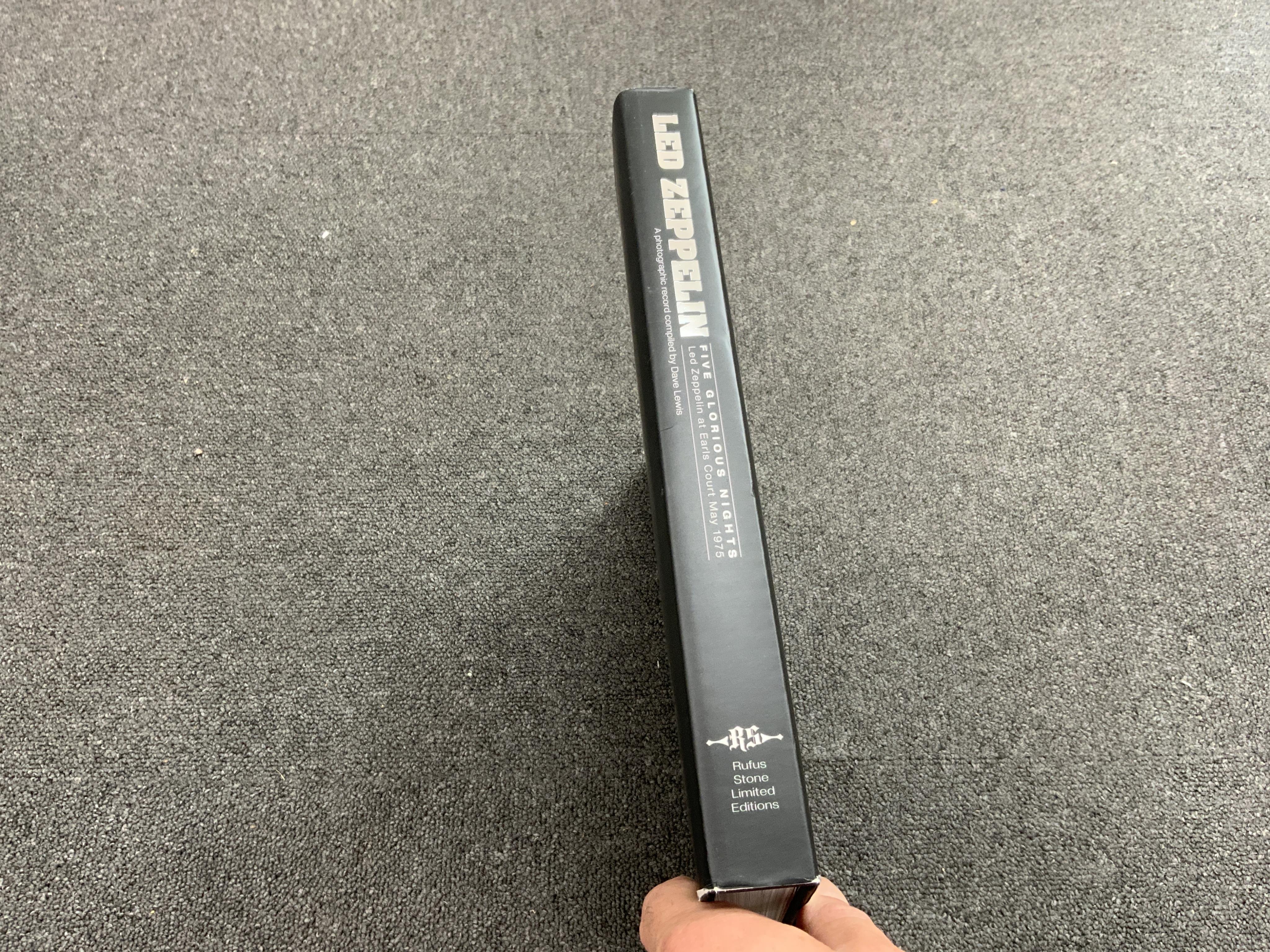 A signed copy of Led Zeppelin - Five Glorious Nights, by Dave Lewis, pub. Rufus Stone Limited Editions Ltd., limited edition 735/1000. Condition - fair